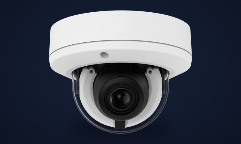 Vandal-resistant dome security camera, lens set behind a clear bubble