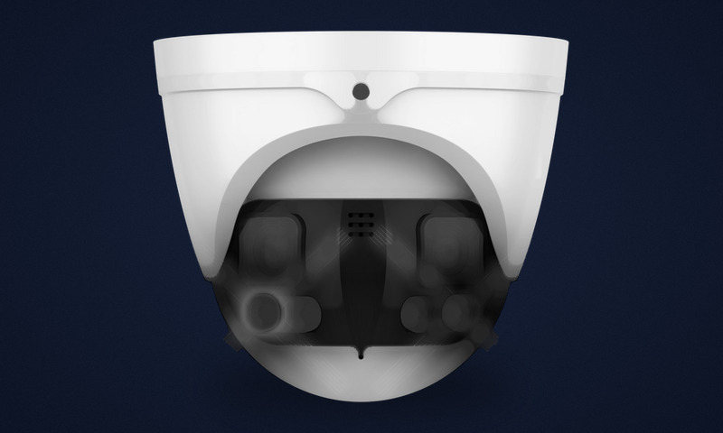 Dual-lens security camera with two lenses in a single housing