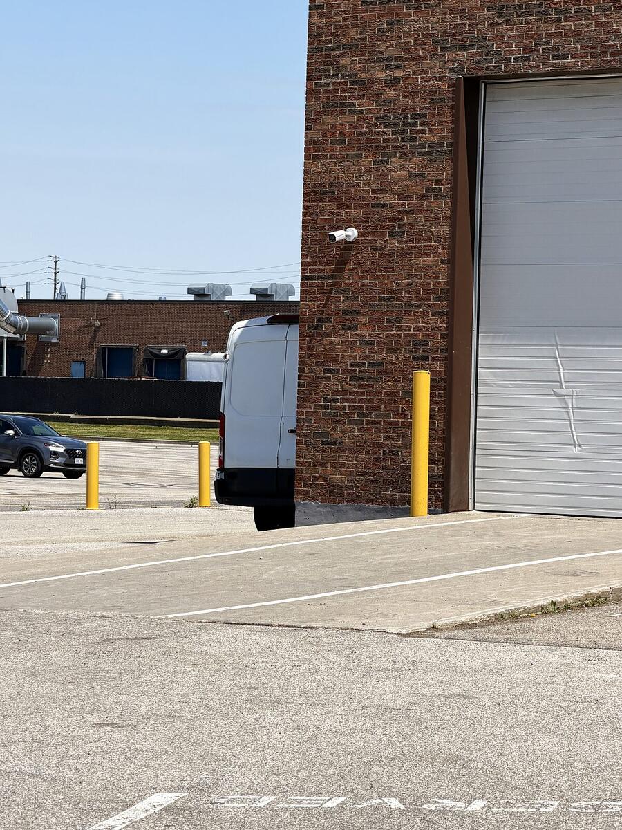 Security camera covering a commercial loading dock and yard