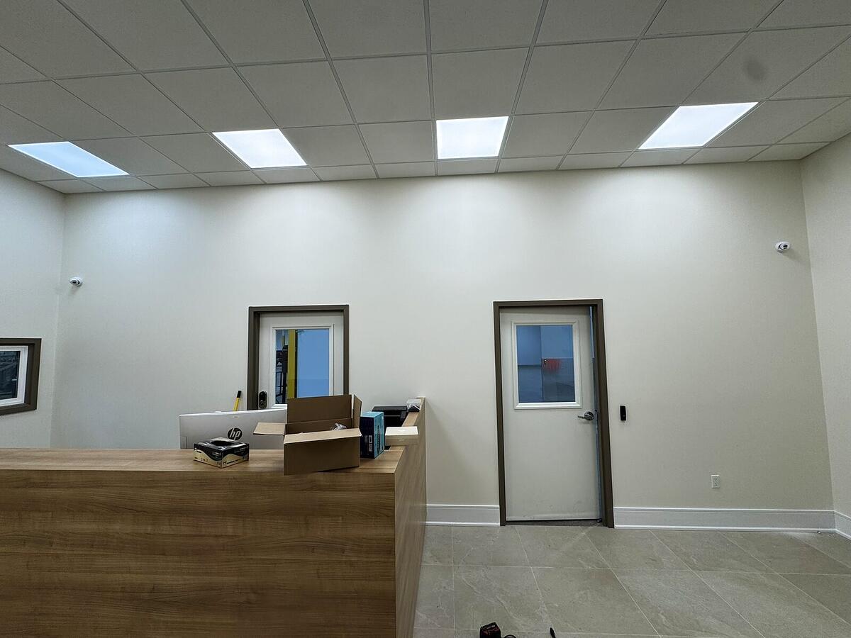 Finished office reception with discreet ceiling cameras installed by RM Security Services